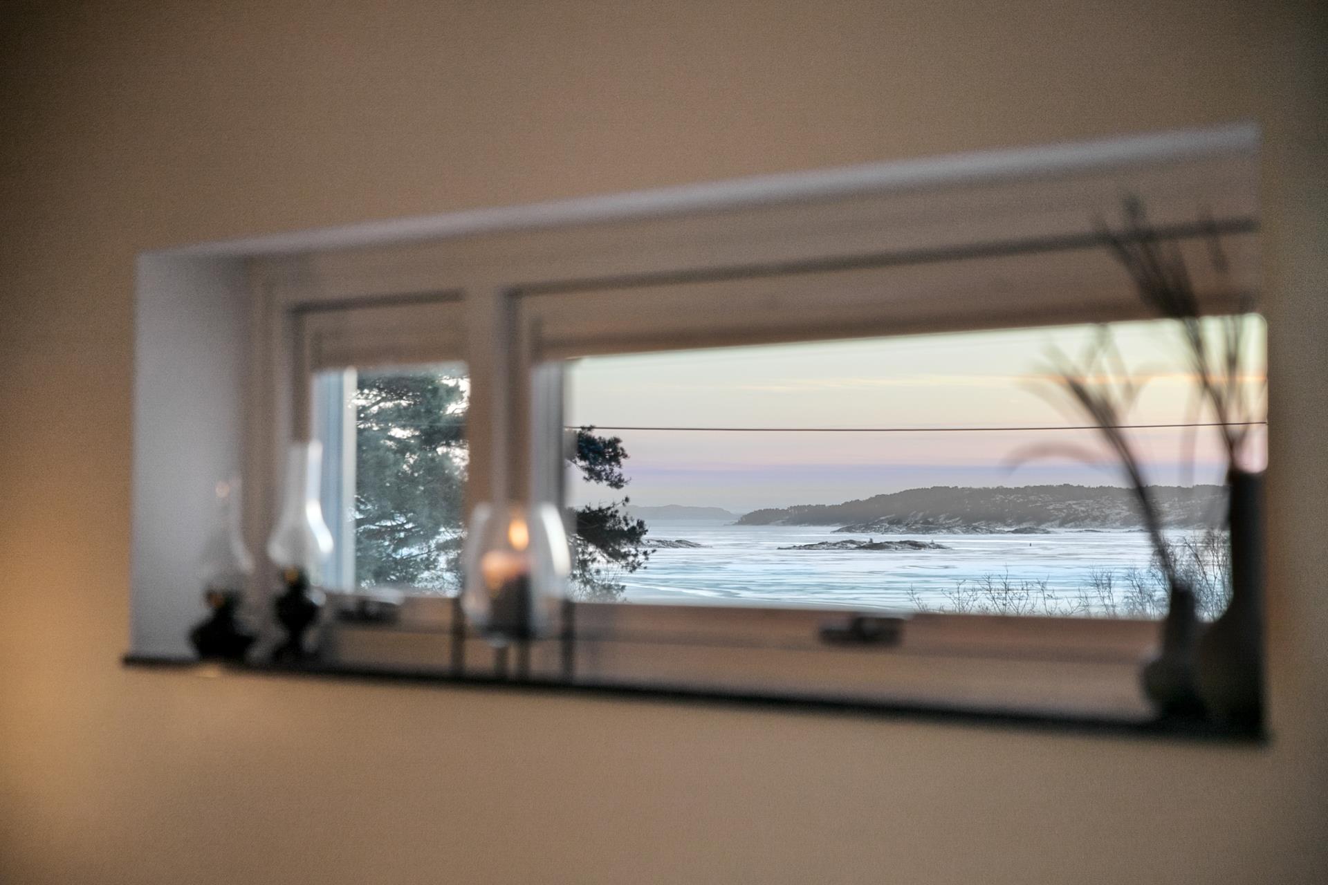 Stilren trea med havsutsikt, hörnläge och privat livskvalitet!